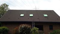Dachbeschichtung mit Dachfenstern