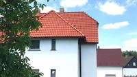 Beispielbild rotes Dach Dachbeschichtung in Remscheid